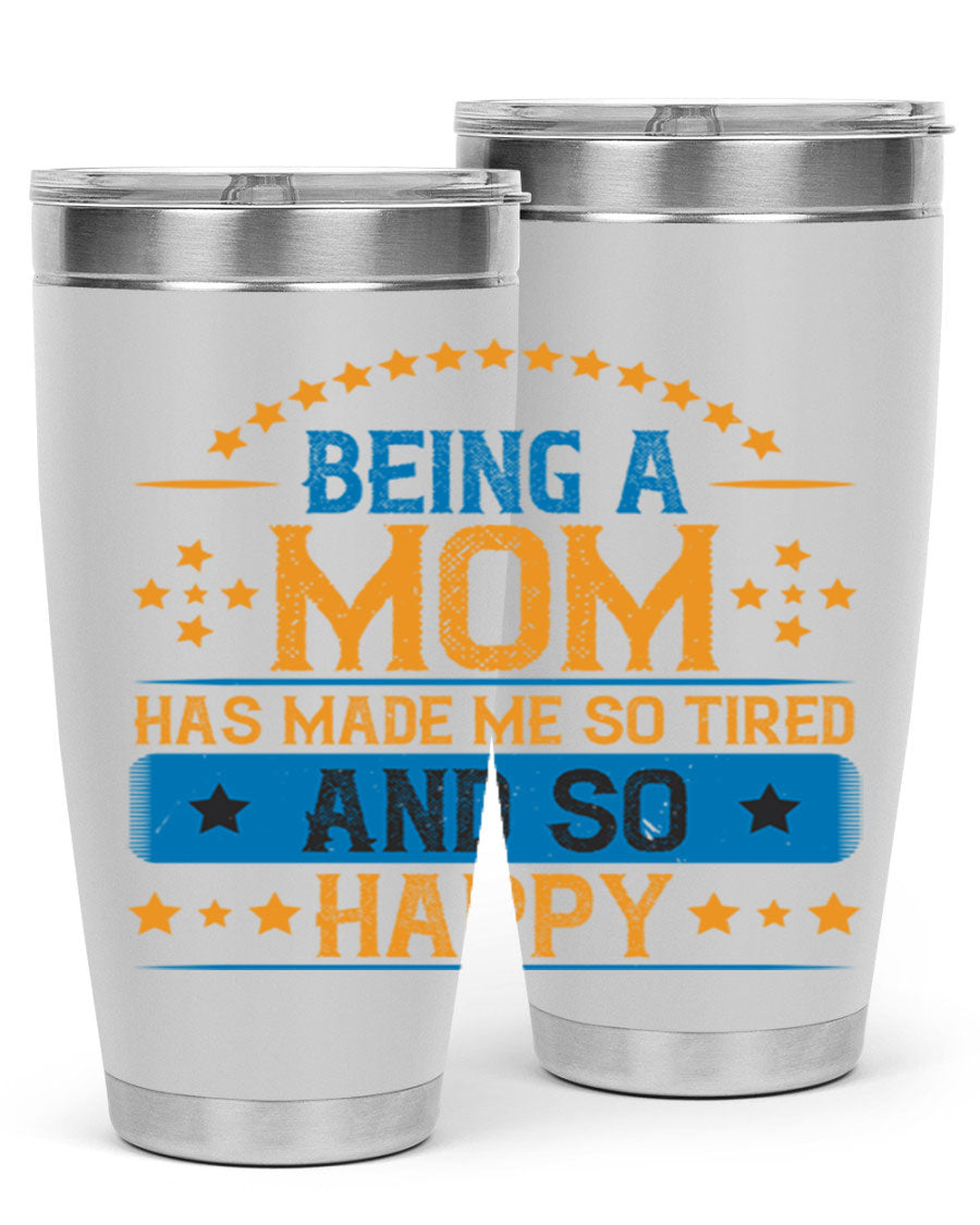 A stylish stainless steel tumbler with the phrase 'Being a Mom Has Made Me So Tired and So Happy', featuring a double wall vacuum design.