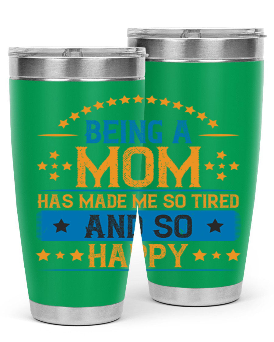 A stylish stainless steel tumbler with the phrase 'Being a Mom Has Made Me So Tired and So Happy', featuring a double wall vacuum design.