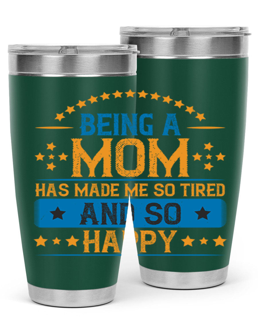 A stylish stainless steel tumbler with the phrase 'Being a Mom Has Made Me So Tired and So Happy', featuring a double wall vacuum design.