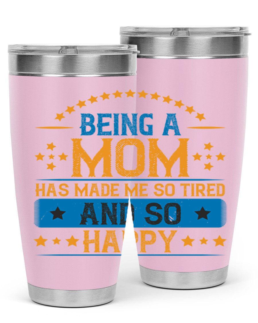 A stylish stainless steel tumbler with the phrase 'Being a Mom Has Made Me So Tired and So Happy', featuring a double wall vacuum design.