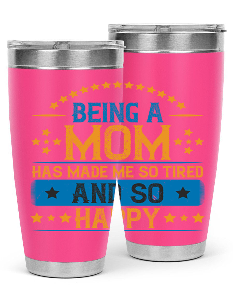 A stylish stainless steel tumbler with the phrase 'Being a Mom Has Made Me So Tired and So Happy', featuring a double wall vacuum design.