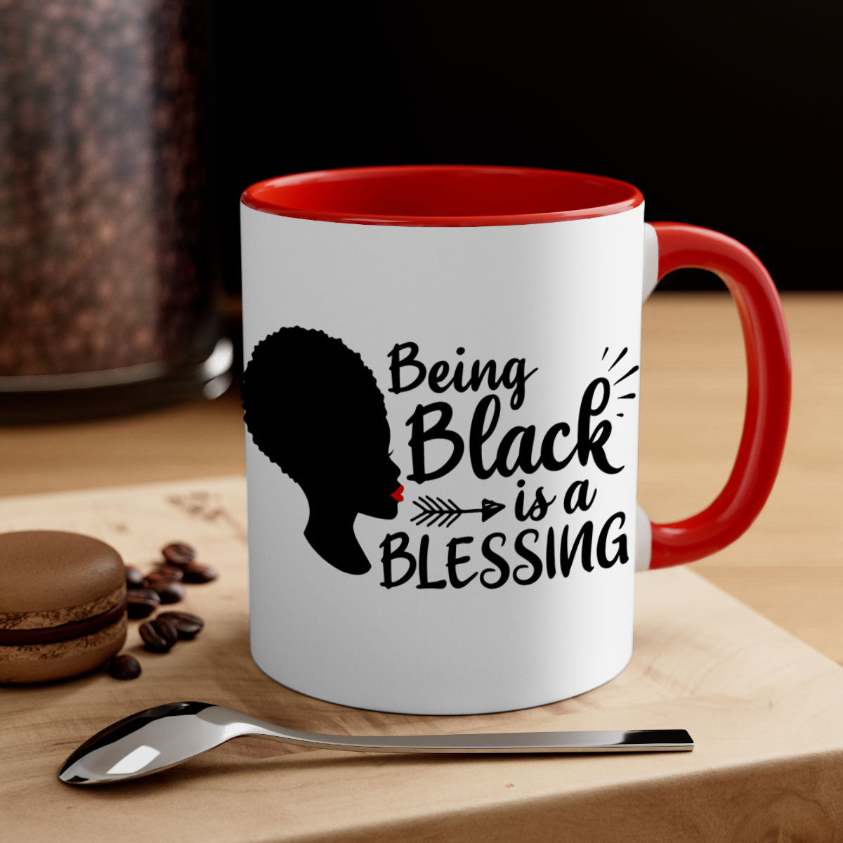 A stylish two-tone ceramic mug with the phrase 'Being Black is a Blessing', featuring a colored handle and glossy finish.