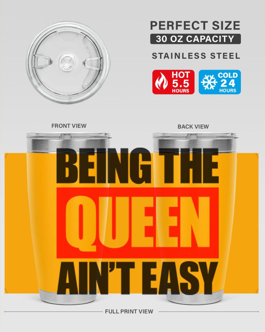 A stylish black cotton tank top featuring the phrase 'Being the Queen Ain't Easy' in bold letters, perfect for casual wear.