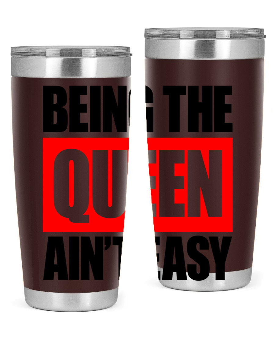 A stylish black cotton tank top featuring the phrase 'Being the Queen Ain't Easy' in bold letters, perfect for casual wear.