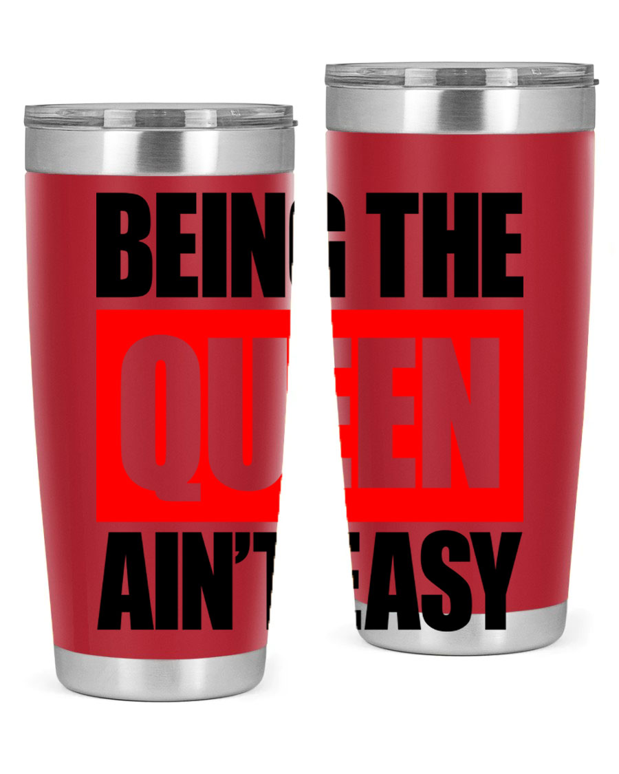 A stylish black cotton tank top featuring the phrase 'Being the Queen Ain't Easy' in bold letters, perfect for casual wear.