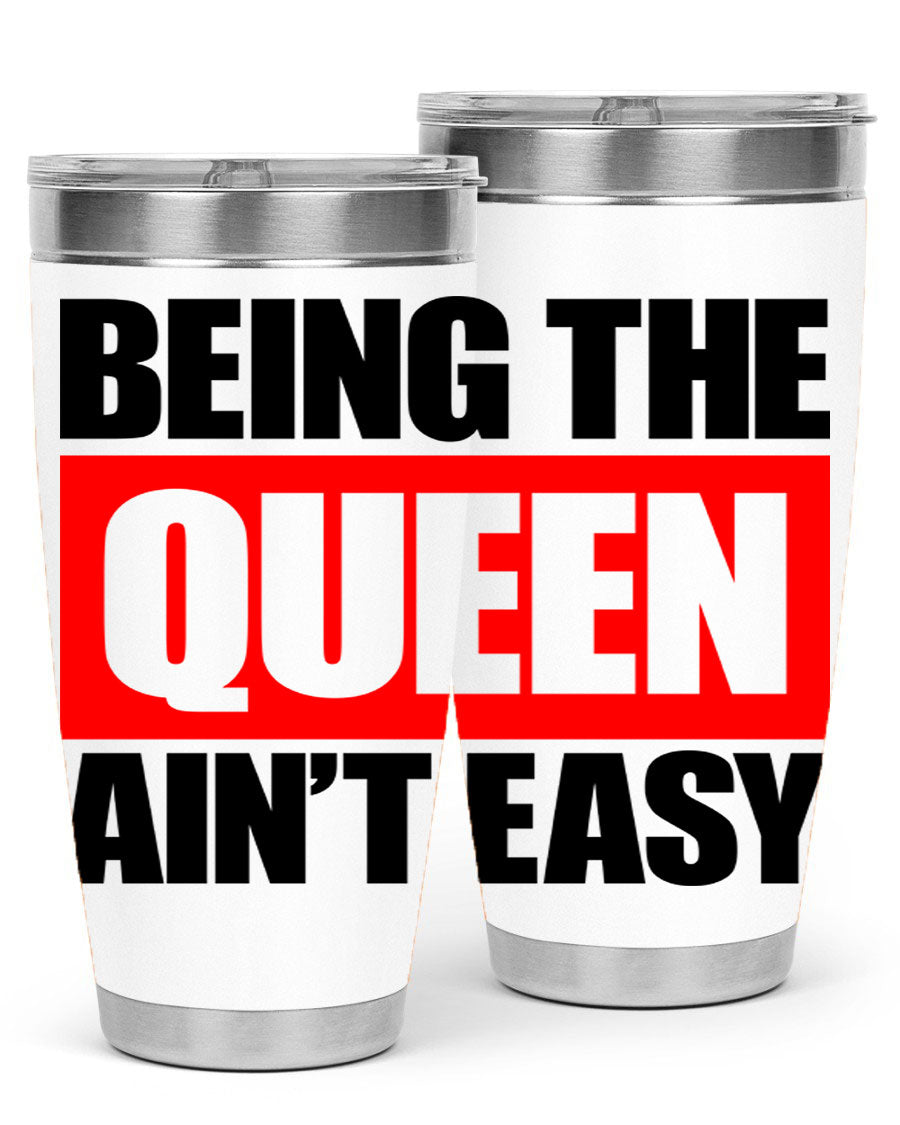 A stylish black cotton tank top featuring the phrase 'Being the Queen Ain't Easy' in bold letters, perfect for casual wear.