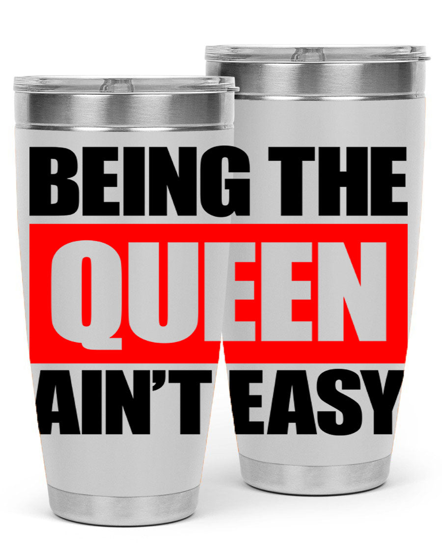 A stylish black cotton tank top featuring the phrase 'Being the Queen Ain't Easy' in bold letters, perfect for casual wear.