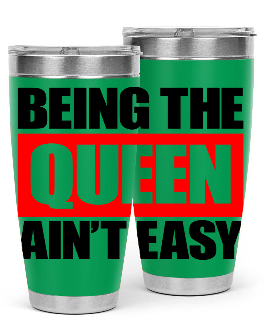 A stylish black cotton tank top featuring the phrase 'Being the Queen Ain't Easy' in bold letters, perfect for casual wear.