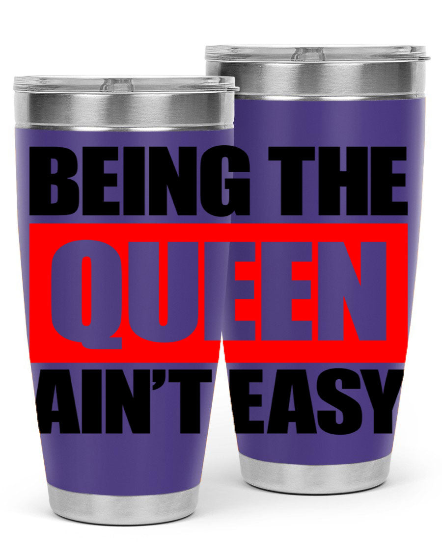 A stylish black cotton tank top featuring the phrase 'Being the Queen Ain't Easy' in bold letters, perfect for casual wear.