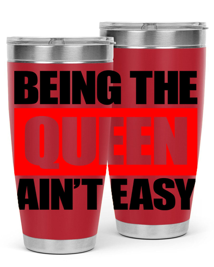 A stylish black cotton tank top featuring the phrase 'Being the Queen Ain't Easy' in bold letters, perfect for casual wear.