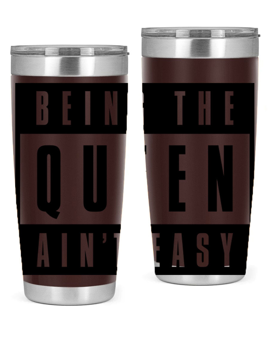 A stylish black cotton tank top featuring the phrase 'Being the Queen Ain't Easy' in bold letters, perfect for casual wear.