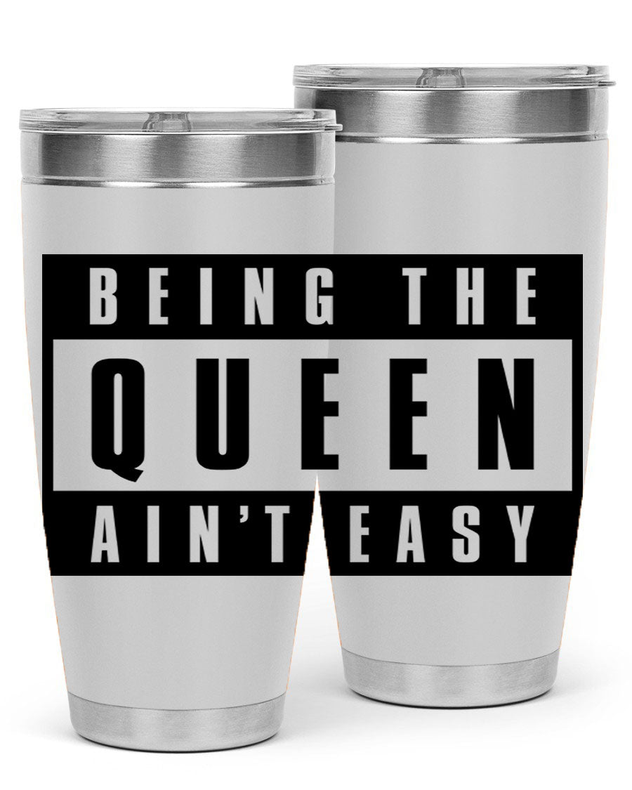A stylish black cotton tank top featuring the phrase 'Being the Queen Ain't Easy' in bold letters, perfect for casual wear.