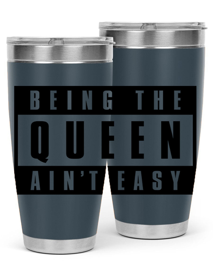 A stylish black cotton tank top featuring the phrase 'Being the Queen Ain't Easy' in bold letters, perfect for casual wear.