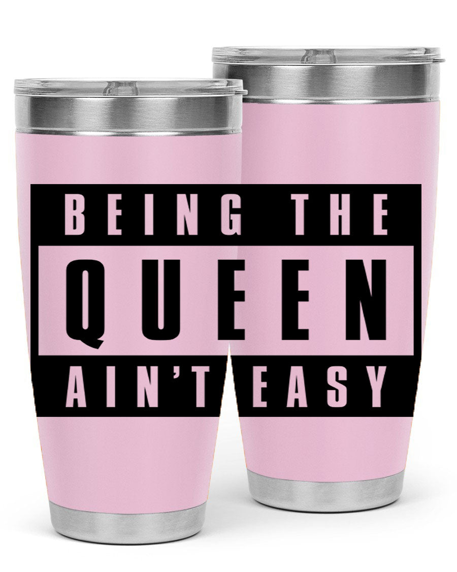 A stylish black cotton tank top featuring the phrase 'Being the Queen Ain't Easy' in bold letters, perfect for casual wear.