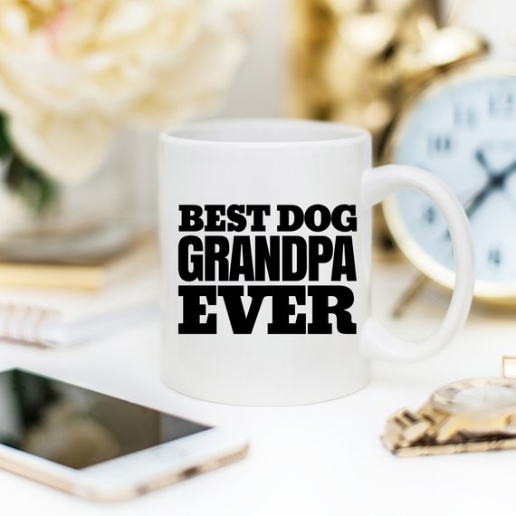 White ceramic mug with 'Best Dog Grandpa Ever' design printed on both sides, perfect for dog lovers.
