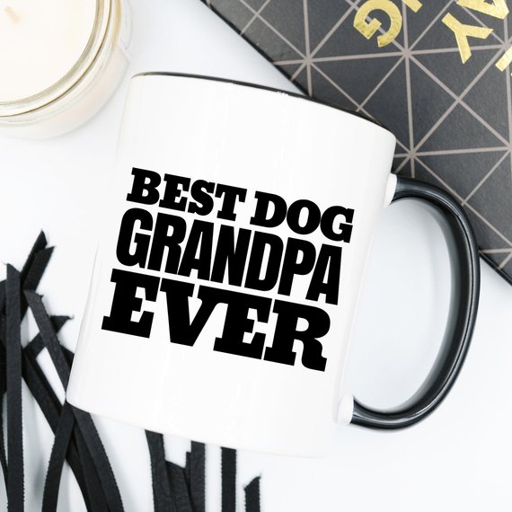 White ceramic mug with 'Best Dog Grandpa Ever' design printed on both sides, perfect for dog lovers.