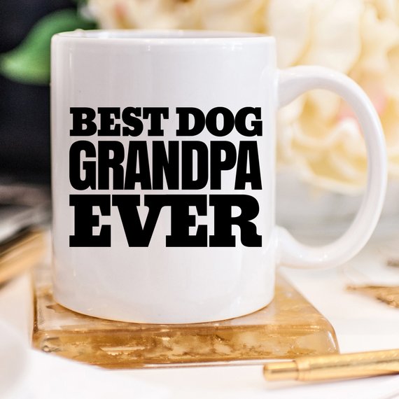 White ceramic mug with 'Best Dog Grandpa Ever' design printed on both sides, perfect for dog lovers.