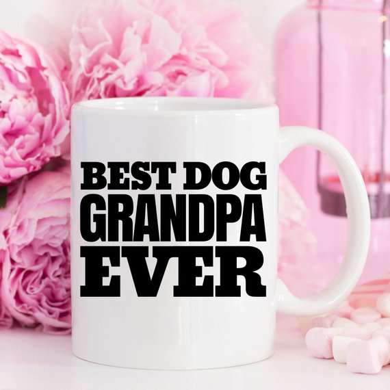 White ceramic mug with 'Best Dog Grandpa Ever' design printed on both sides, perfect for dog lovers.
