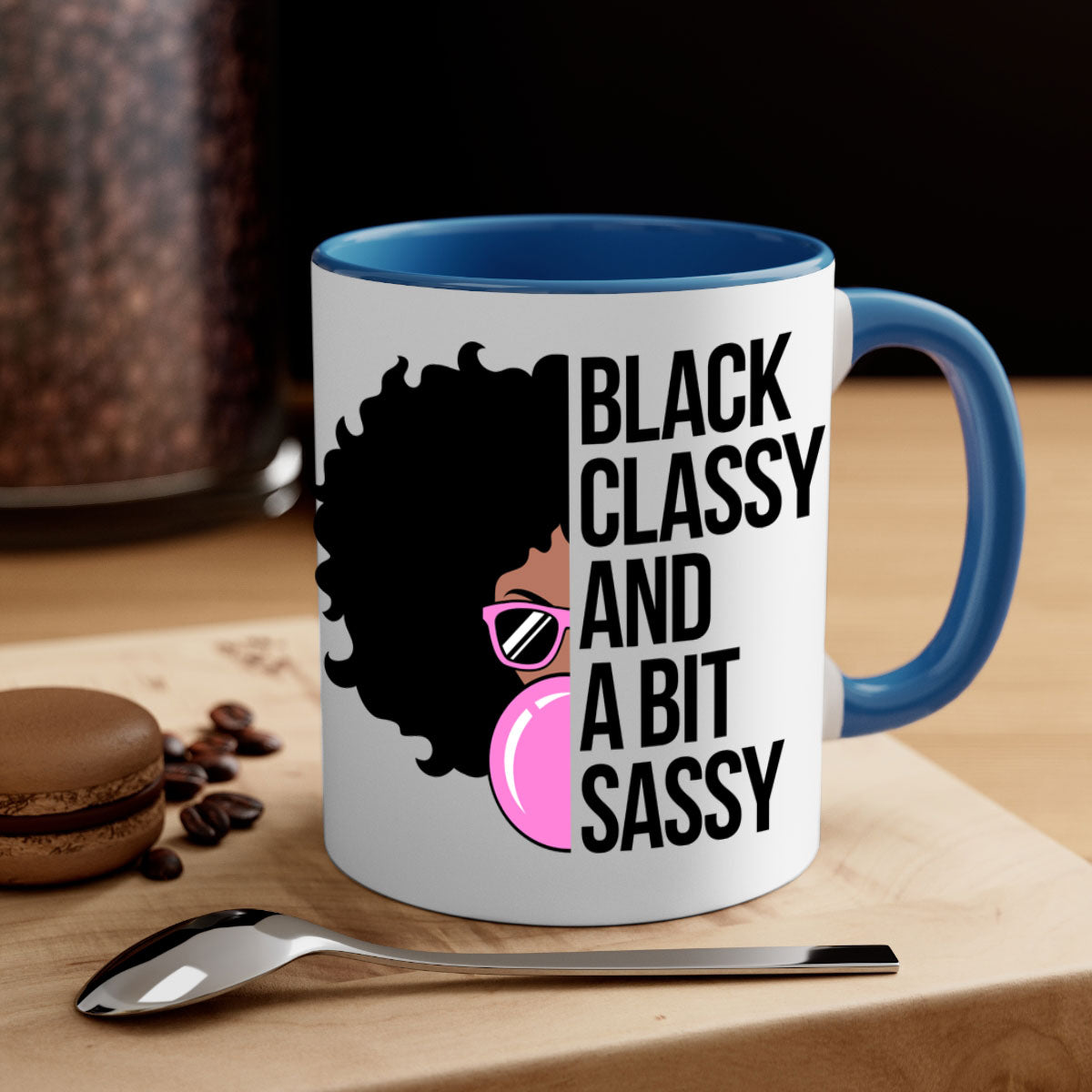 A stylish black classy and a bit sassy mug featuring a glossy finish, colored handle, and interior, perfect for coffee and tea.