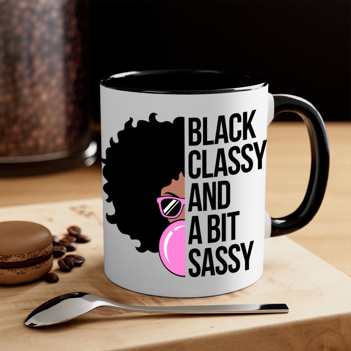 A stylish black classy and a bit sassy mug featuring a glossy finish, colored handle, and interior, perfect for coffee and tea.