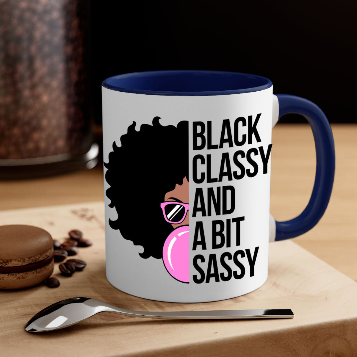 A stylish black classy and a bit sassy mug featuring a glossy finish, colored handle, and interior, perfect for coffee and tea.