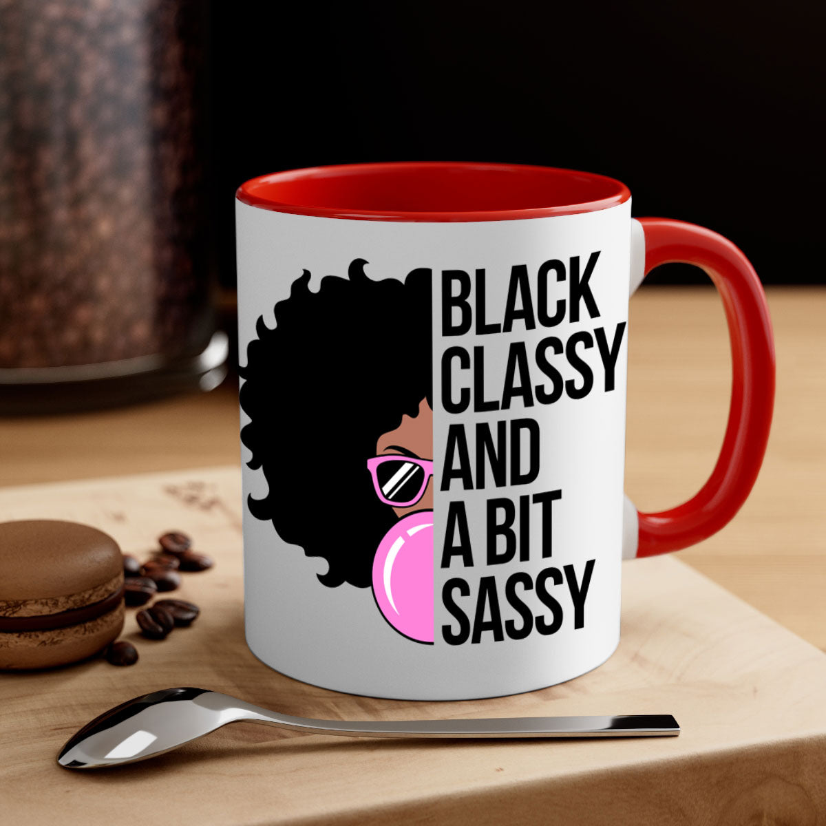 A stylish black classy and a bit sassy mug featuring a glossy finish, colored handle, and interior, perfect for coffee and tea.