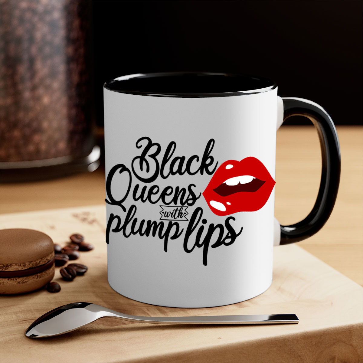 Black Queens Plump Lips Mug with two-tone design, featuring a glossy finish and colored handle, perfect for coffee and tea lovers.