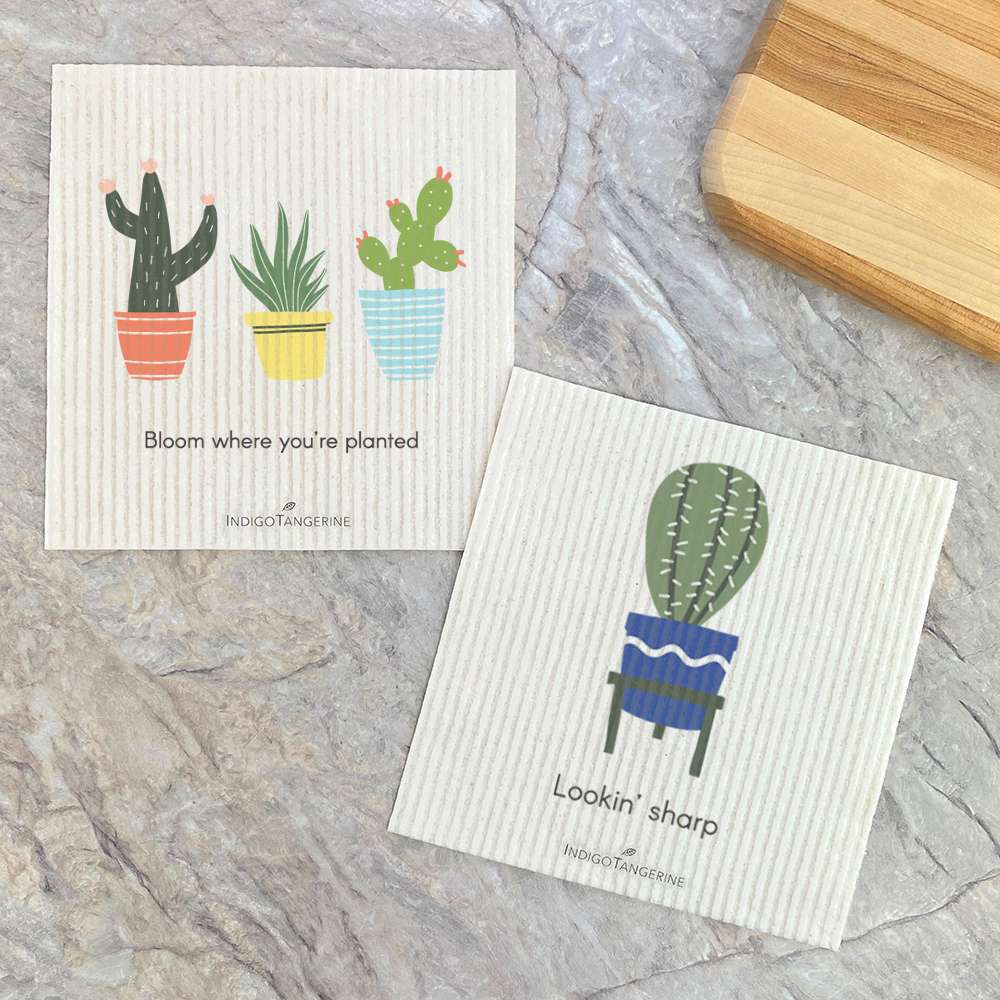 Two Swedish dish cloths featuring cactus designs, eco-friendly and compostable, perfect for sustainable cleaning.
