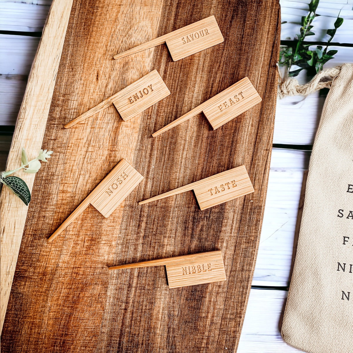 Handmade Acacia Wood Serving Board with Bamboo Markers, featuring a natural grain finish and a convenient handle for easy serving.