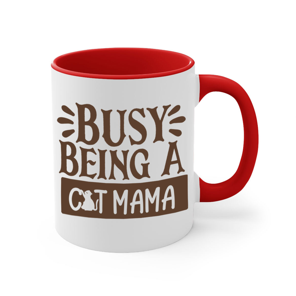 A two-tone ceramic mug with a colored handle and interior, featuring the phrase 'Busy Being A Cat Mama' in a stylish font.