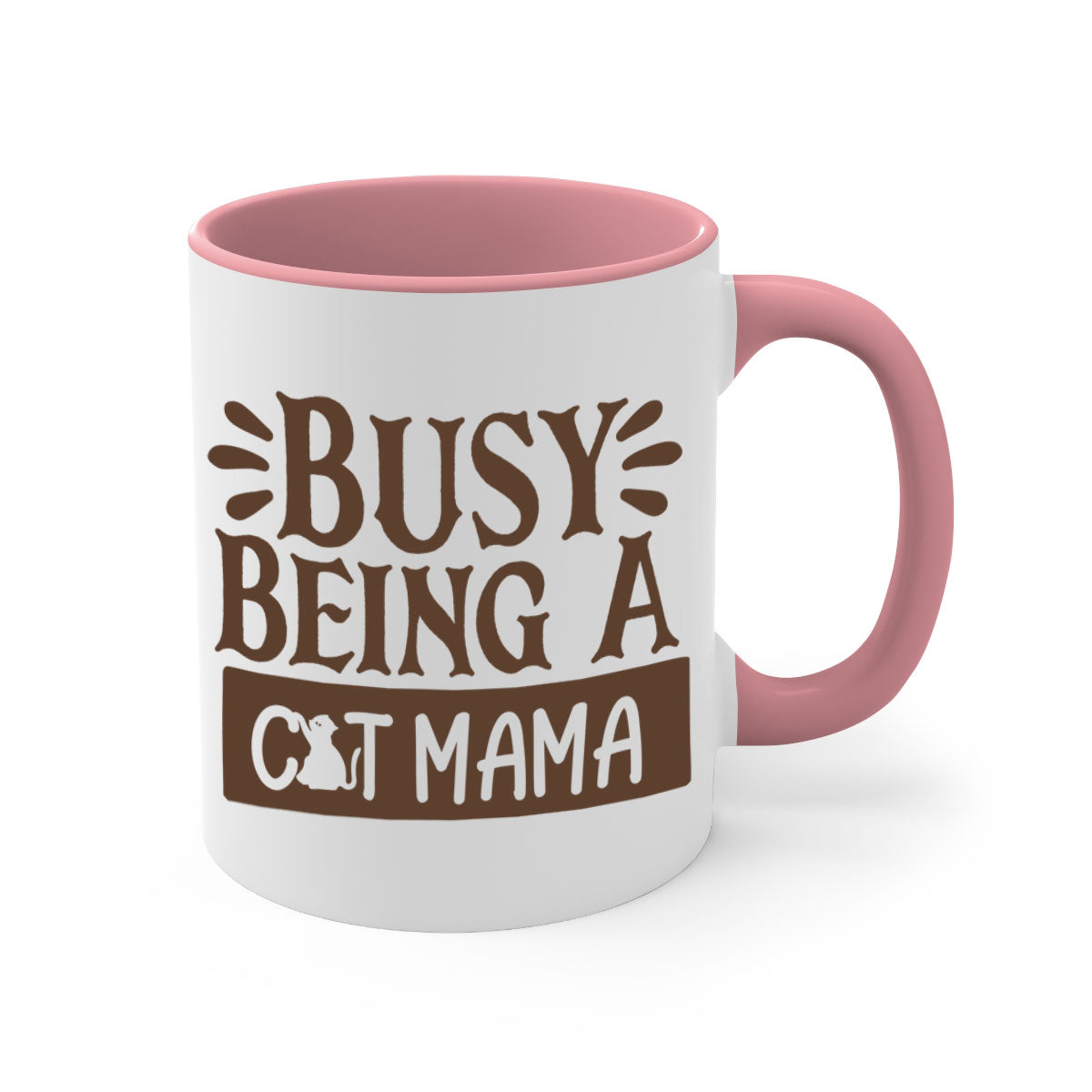A two-tone ceramic mug with a colored handle and interior, featuring the phrase 'Busy Being A Cat Mama' in a stylish font.
