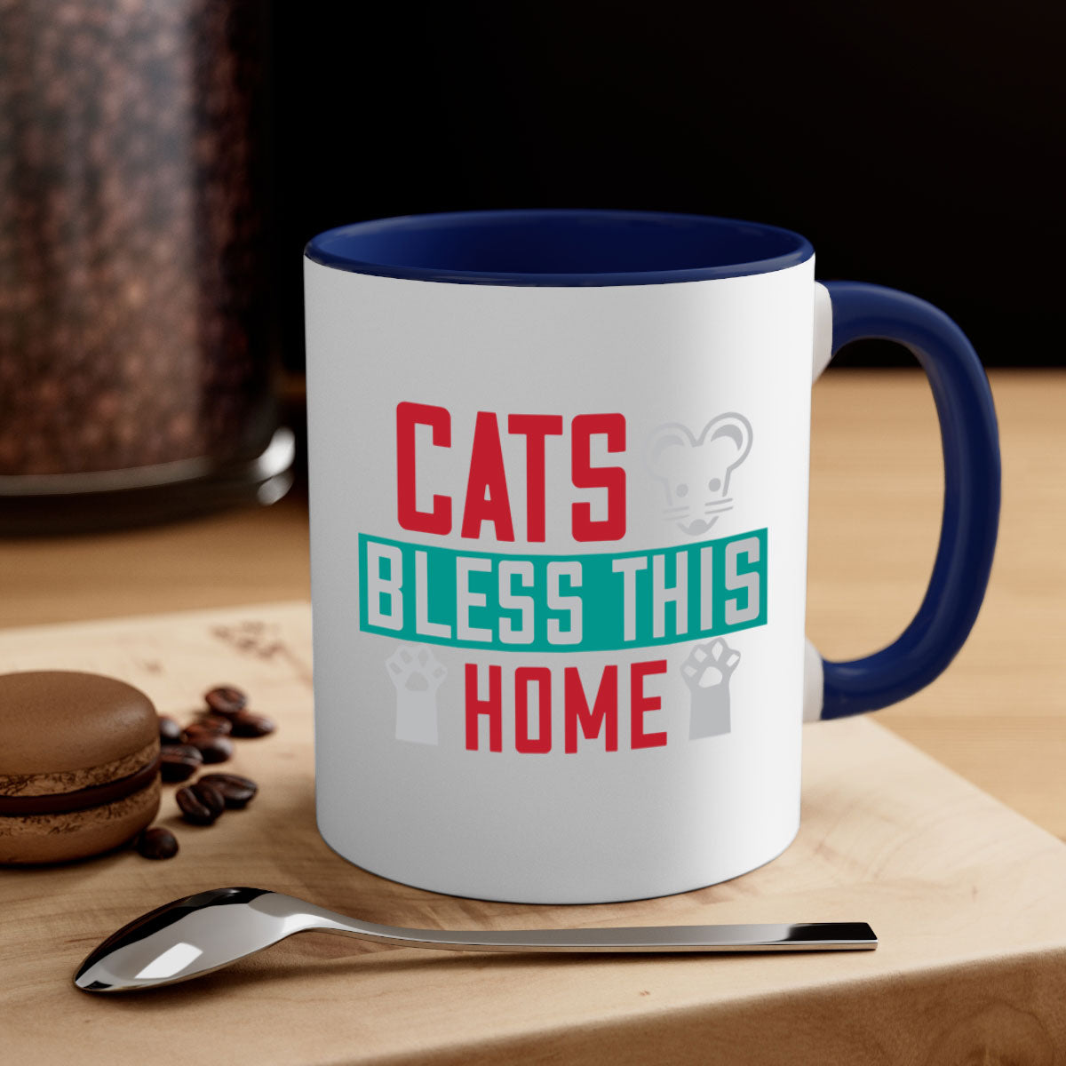 Ceramic 'Cats Bless This Home' mug with a glossy finish, featuring a colored handle and interior, available in multiple colors.