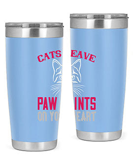 A stylish 20oz and 30oz tumbler featuring a cat-themed design that says 'Cats Leave Paw Prints on Your Heart', made of stainless steel.