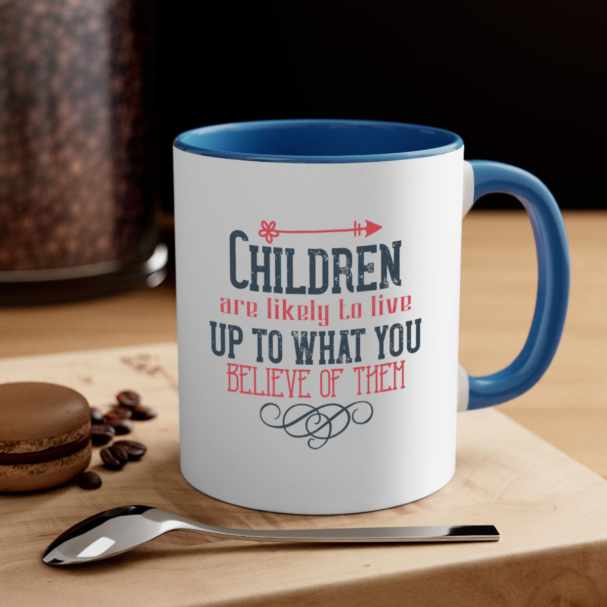 A stylish two-tone ceramic mug featuring the phrase 'Children are likely to live up to what you believe of them' with a glossy finish and colored handle.