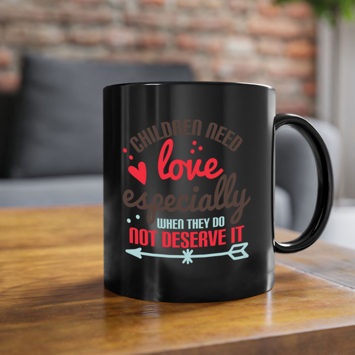 A stylish two-tone ceramic mug with a colored handle and glossy finish, featuring the phrase 'Children need love especially when they do not deserve it'.
