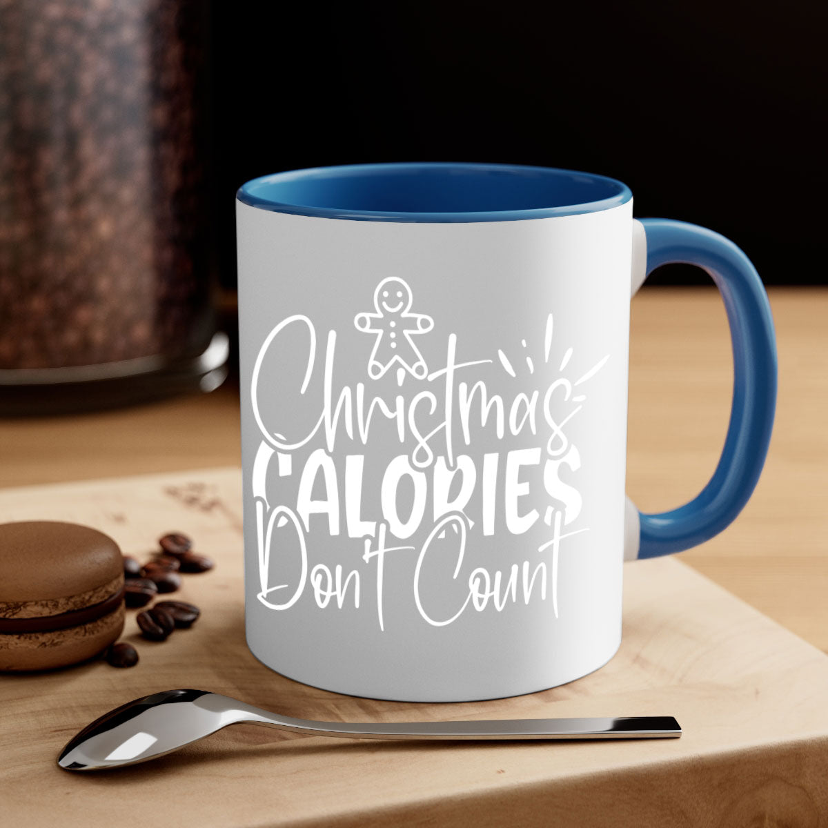 Two-tone Christmas mug with 'Christmas Calories Don't Count' slogan, featuring a colored handle and glossy finish.
