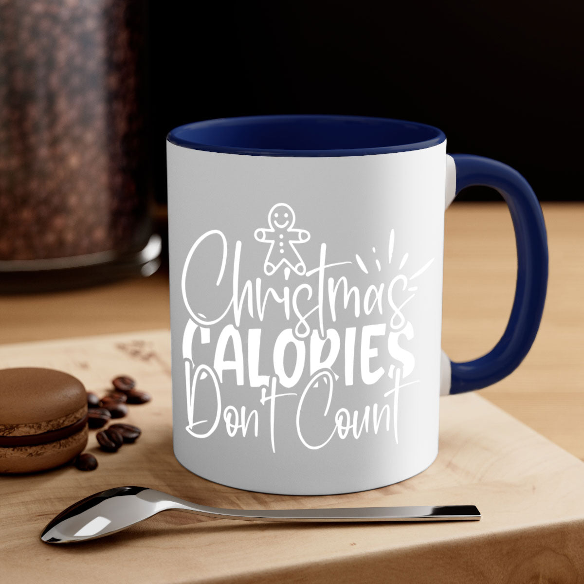 Two-tone Christmas mug with 'Christmas Calories Don't Count' slogan, featuring a colored handle and glossy finish.