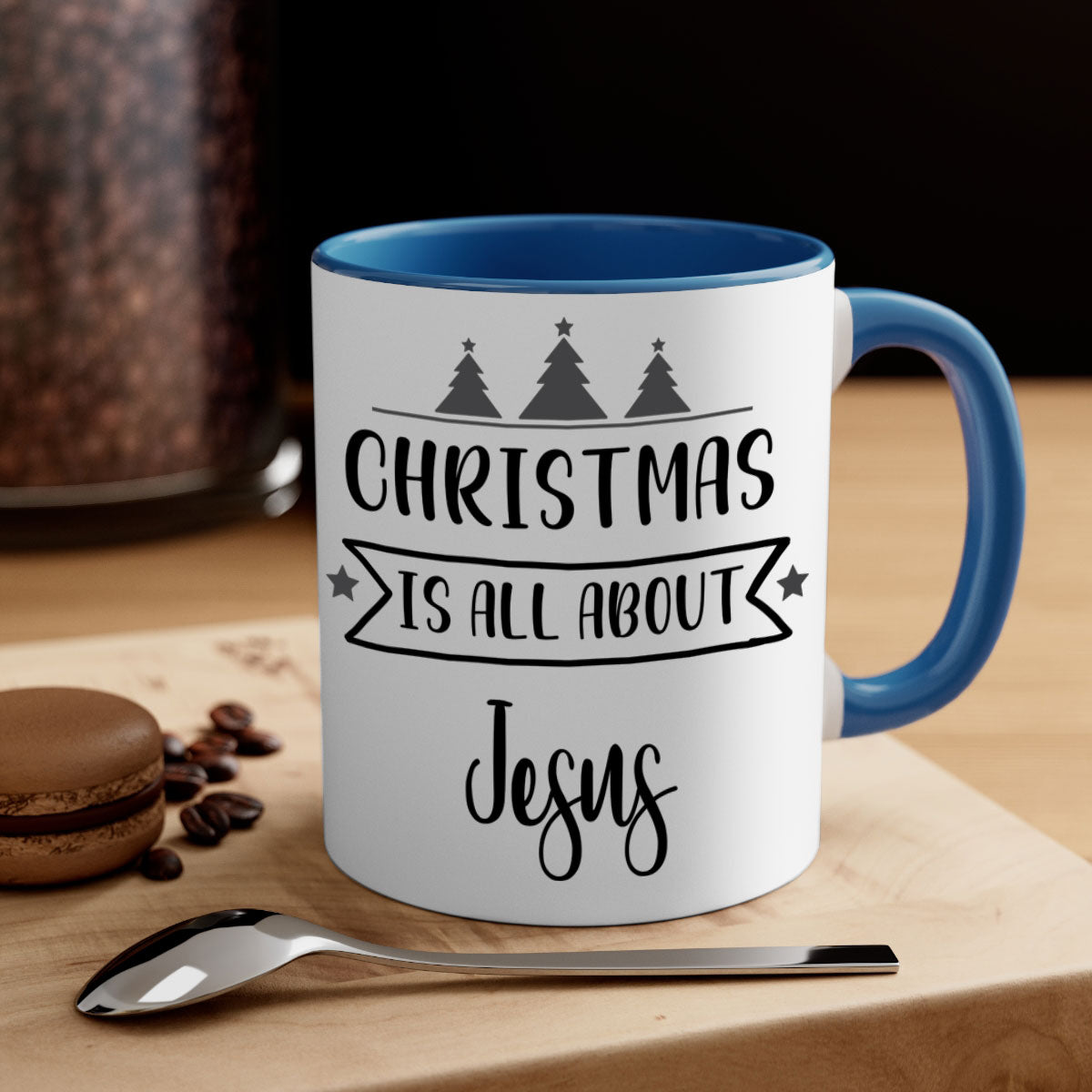 Christmas is All About Jesus Mug featuring a glossy finish and colorful handle, available in multiple sizes.