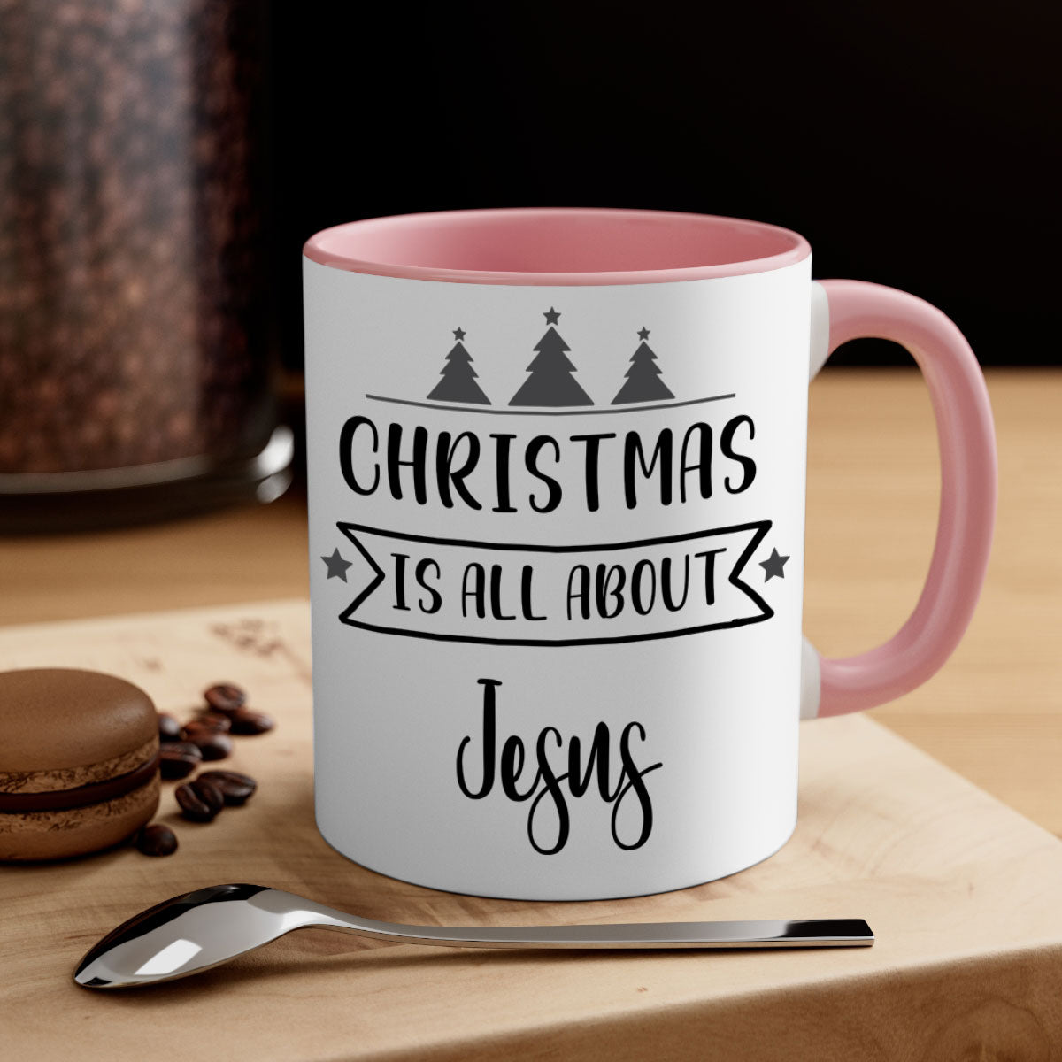 Christmas is All About Jesus Mug featuring a glossy finish and colorful handle, available in multiple sizes.