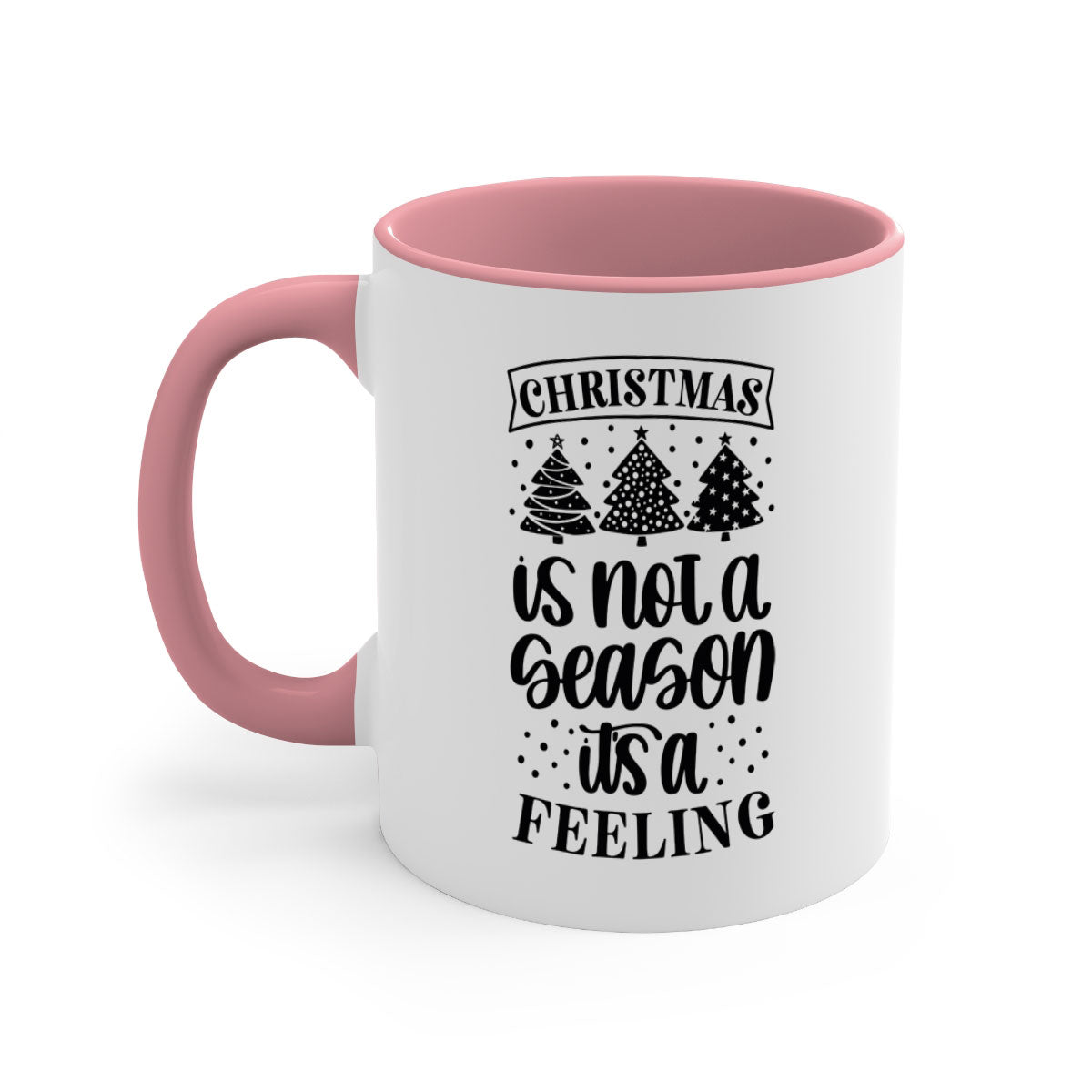 A two-tone ceramic mug with a glossy finish featuring the phrase 'Christmas is Not a Season, It's a Feeling', available in multiple colors.