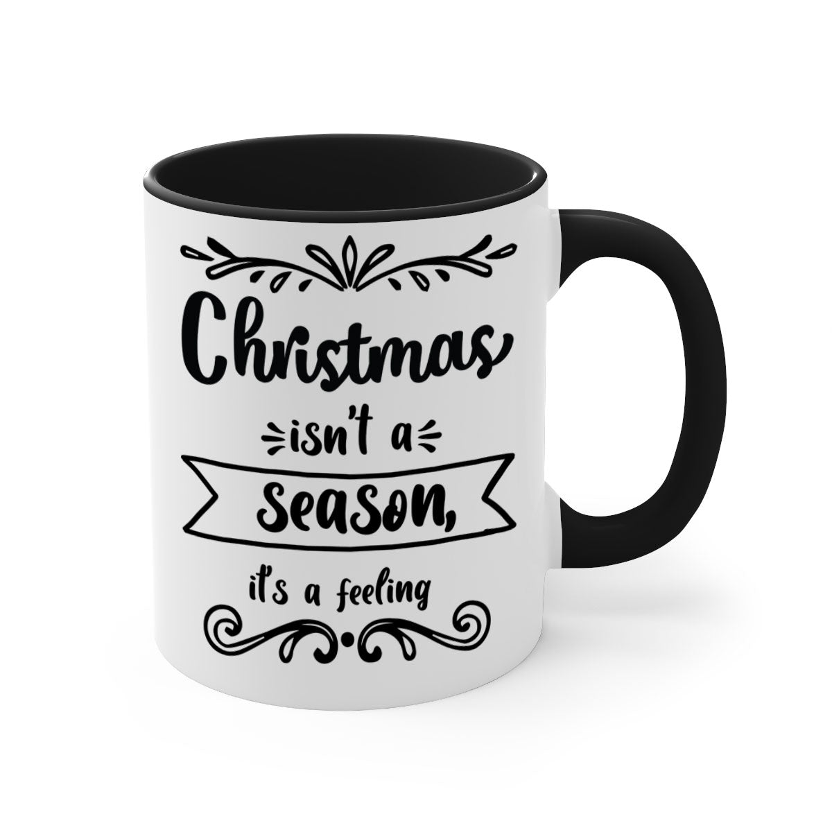 A festive two-tone Christmas mug with a colored handle and interior, featuring the phrase 'Christmas Isn't a Season, It's a Feeling'.