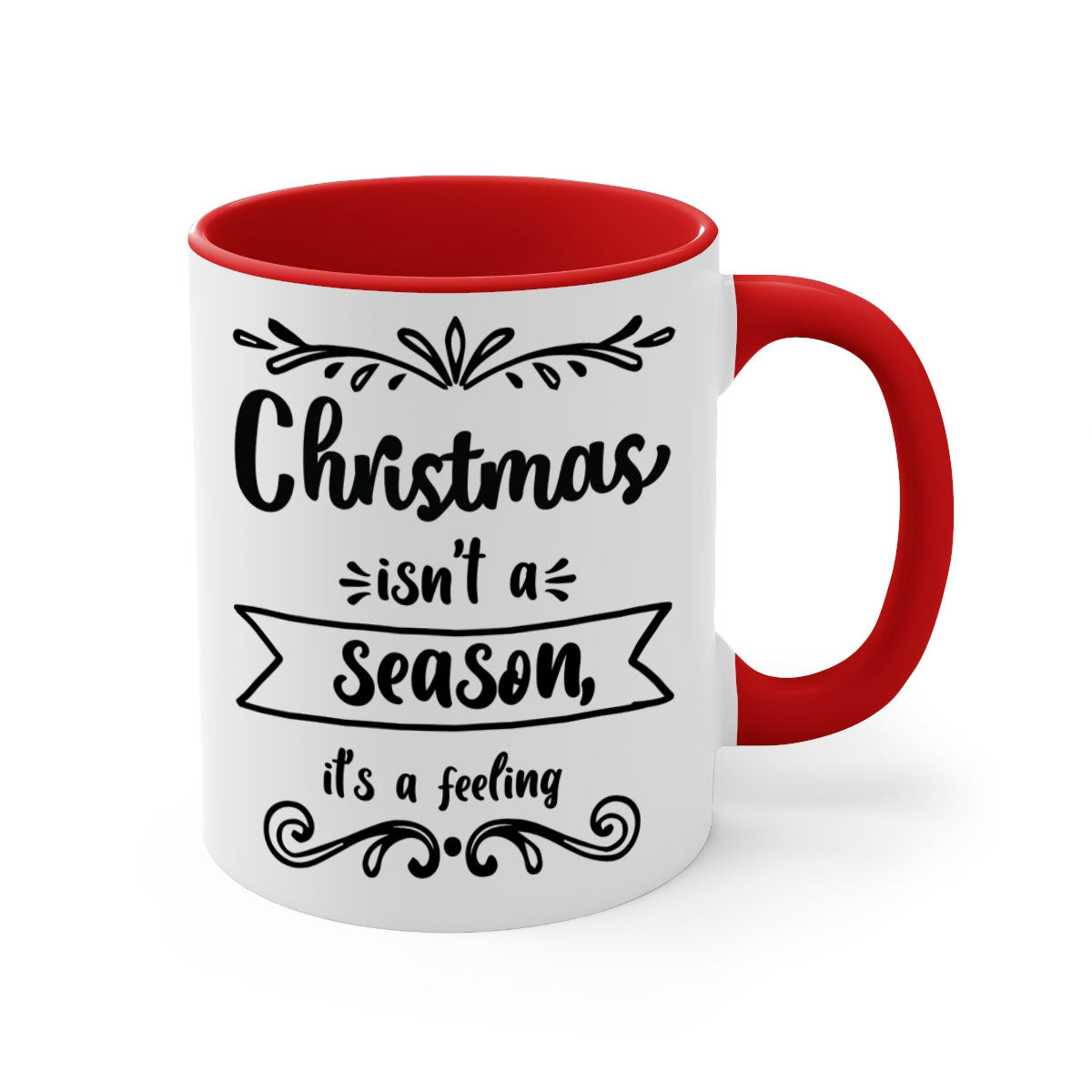 A festive two-tone Christmas mug with a colored handle and interior, featuring the phrase 'Christmas Isn't a Season, It's a Feeling'.