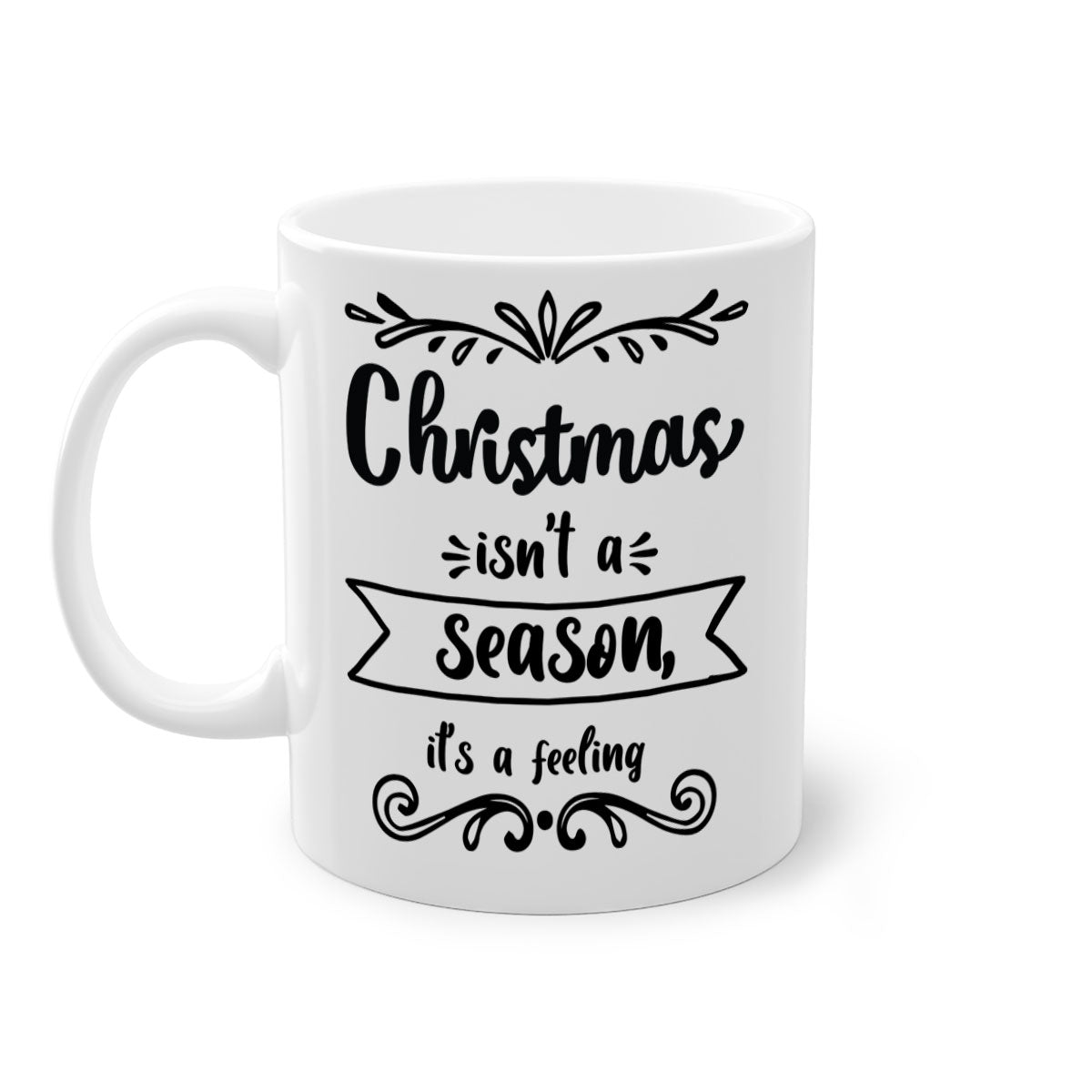 A festive two-tone Christmas mug with a colored handle and interior, featuring the phrase 'Christmas Isn't a Season, It's a Feeling'.