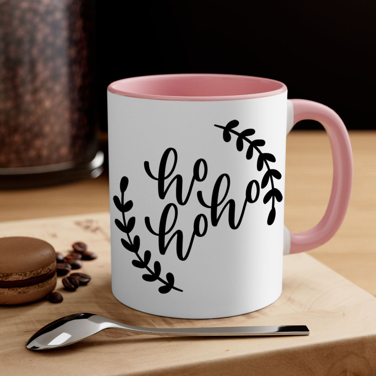 A festive Ho Ho Ho Christmas Mug with a glossy finish, featuring a colored handle and interior, perfect for holiday beverages.