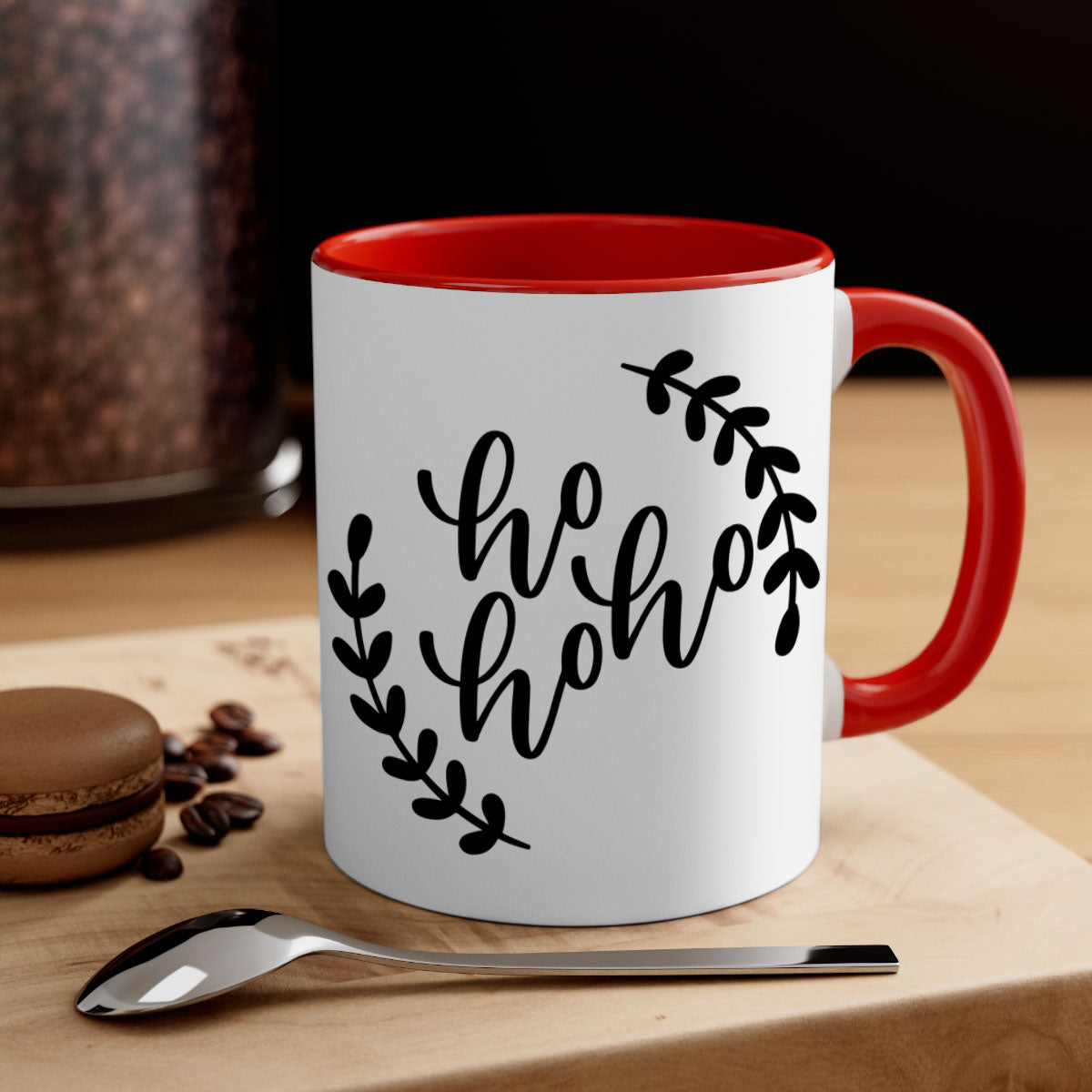 A festive Ho Ho Ho Christmas Mug with a glossy finish, featuring a colored handle and interior, perfect for holiday beverages.