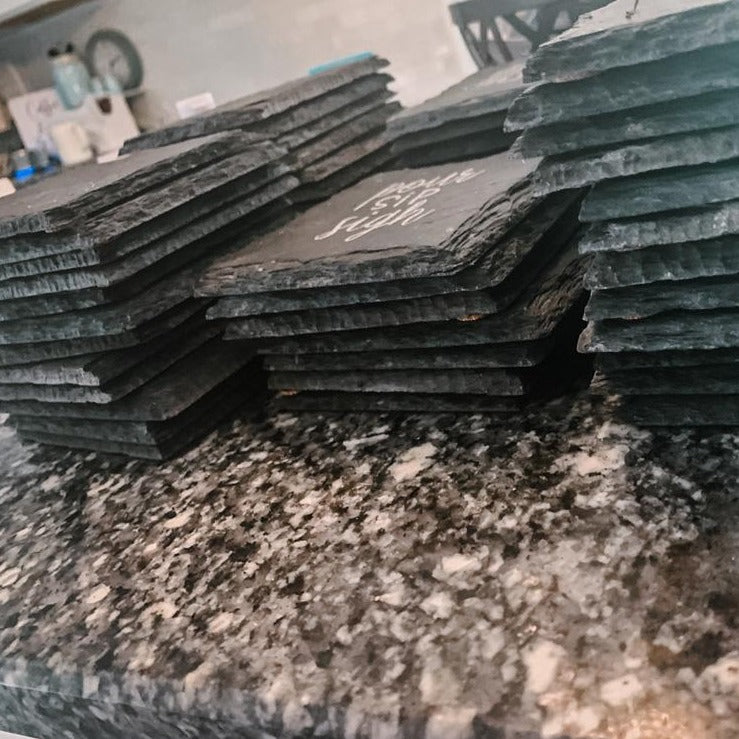 Premium artisan crafted slate coaster with cork feet, hand-stamped design, perfect for coffee lovers.