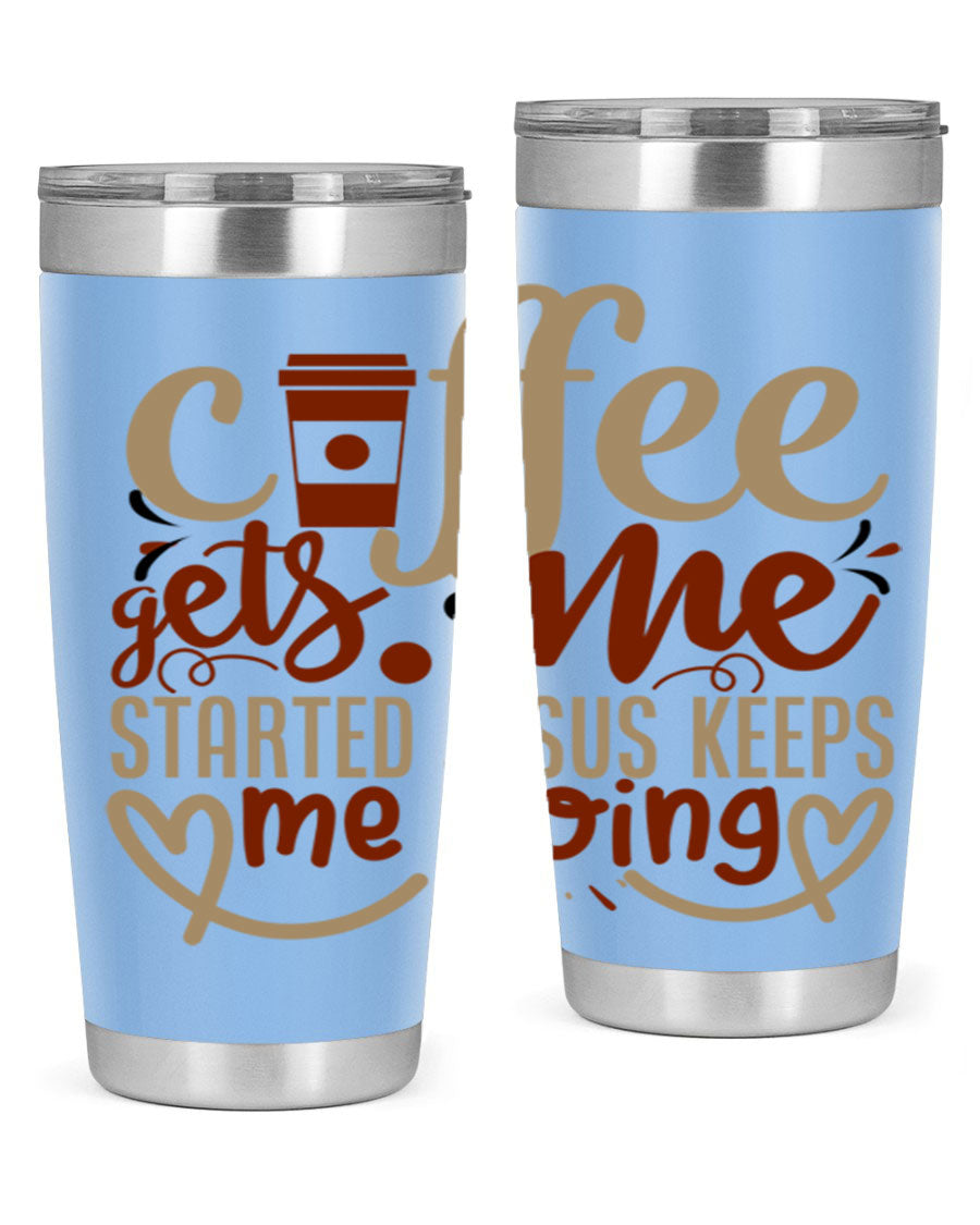 A stylish stainless steel tumbler with the phrase 'Coffee Gets Me Started, Jesus Keeps Me Going' printed on it, showcasing its double wall vacuum insulation.