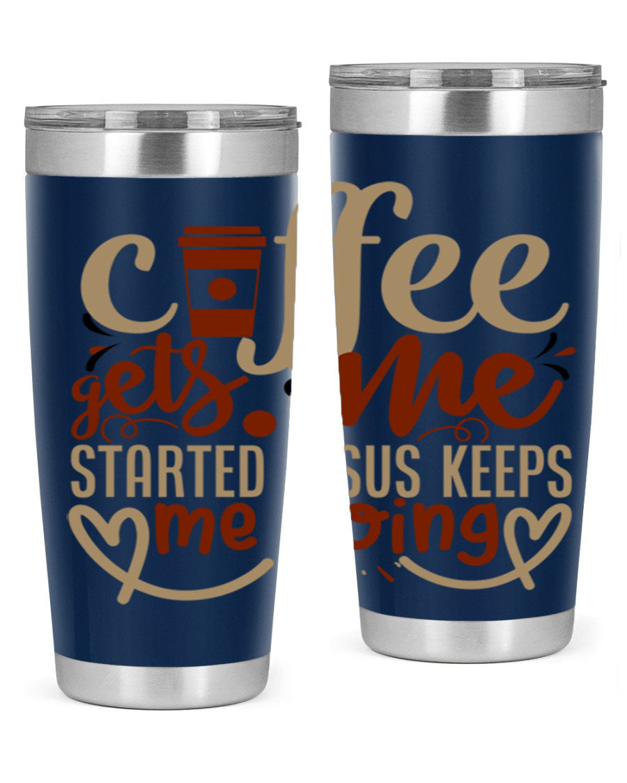 A stylish stainless steel tumbler with the phrase 'Coffee Gets Me Started, Jesus Keeps Me Going' printed on it, showcasing its double wall vacuum insulation.