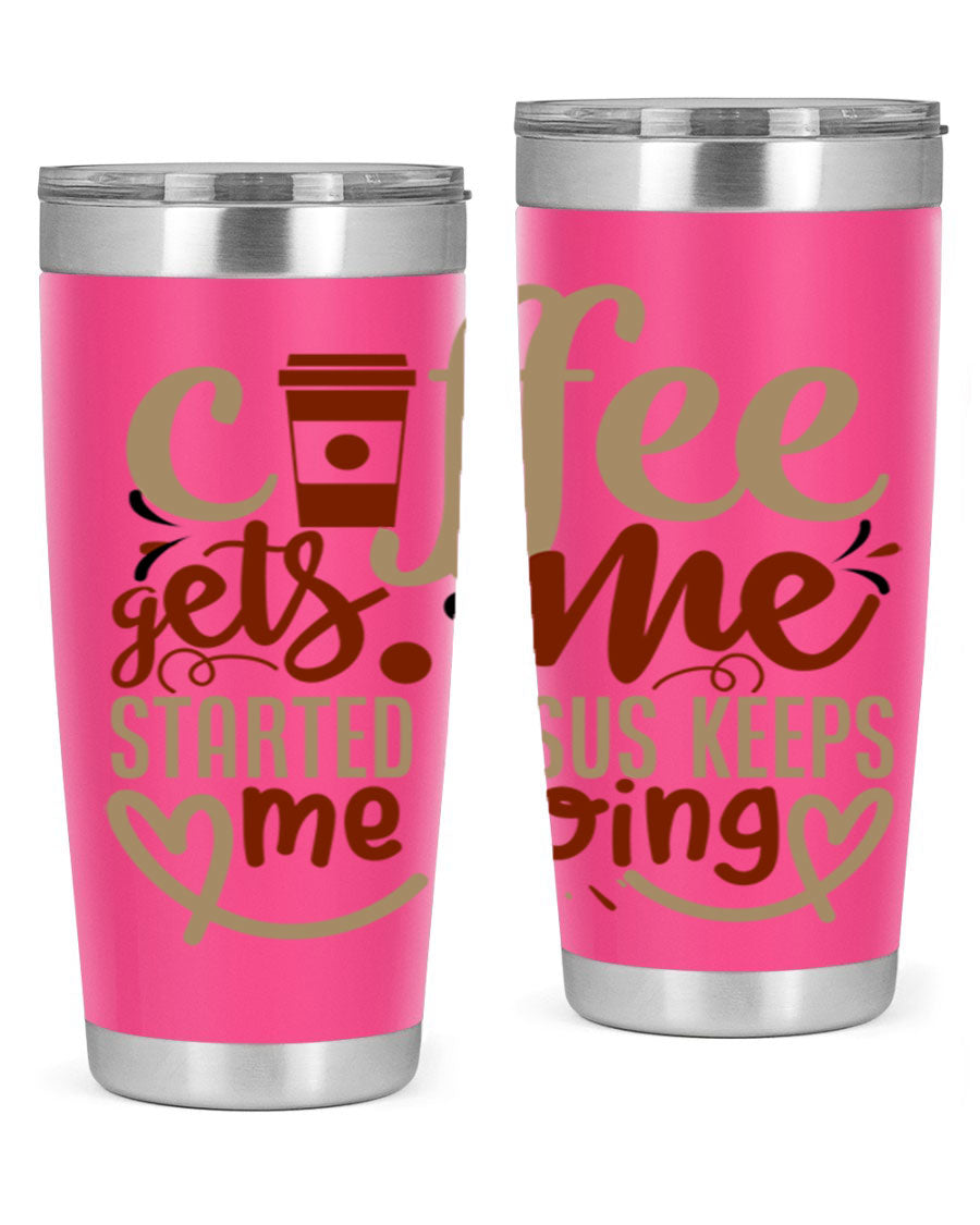 A stylish stainless steel tumbler with the phrase 'Coffee Gets Me Started, Jesus Keeps Me Going' printed on it, showcasing its double wall vacuum insulation.