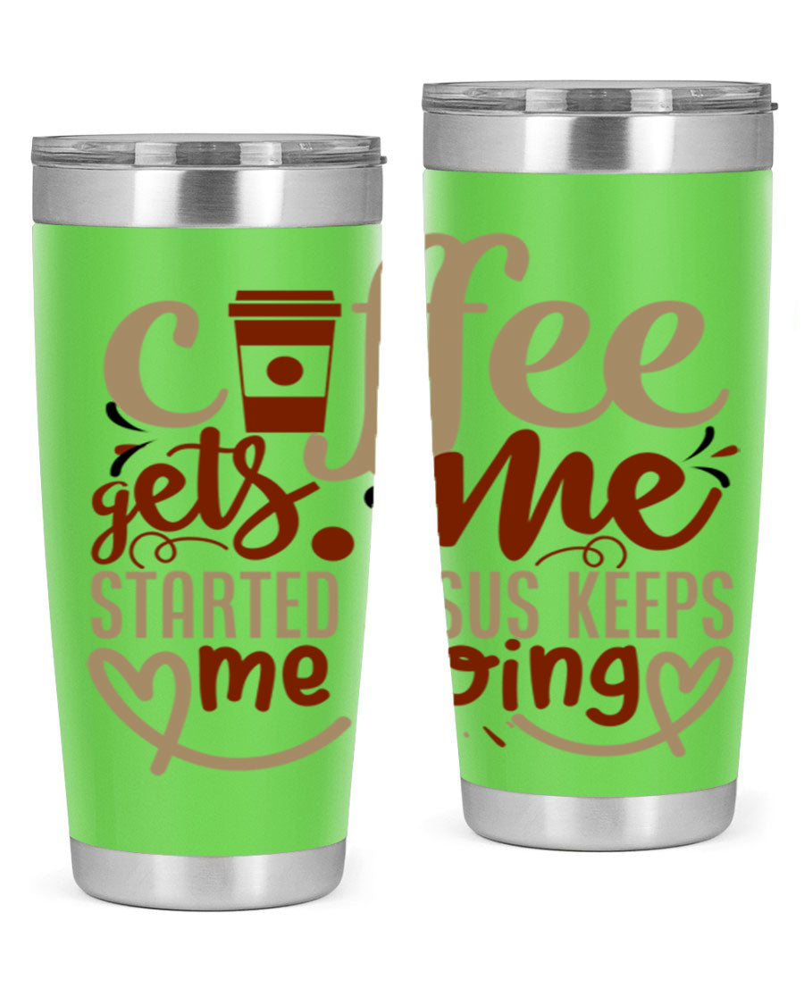 A stylish stainless steel tumbler with the phrase 'Coffee Gets Me Started, Jesus Keeps Me Going' printed on it, showcasing its double wall vacuum insulation.